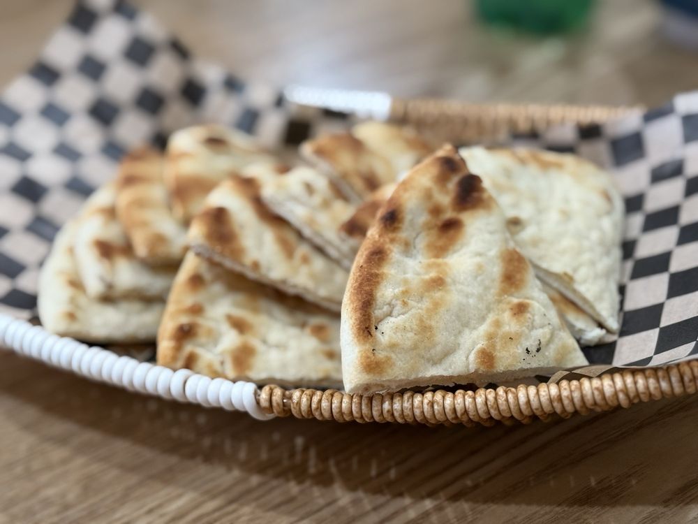 Homemade pita bread with a crisp edge